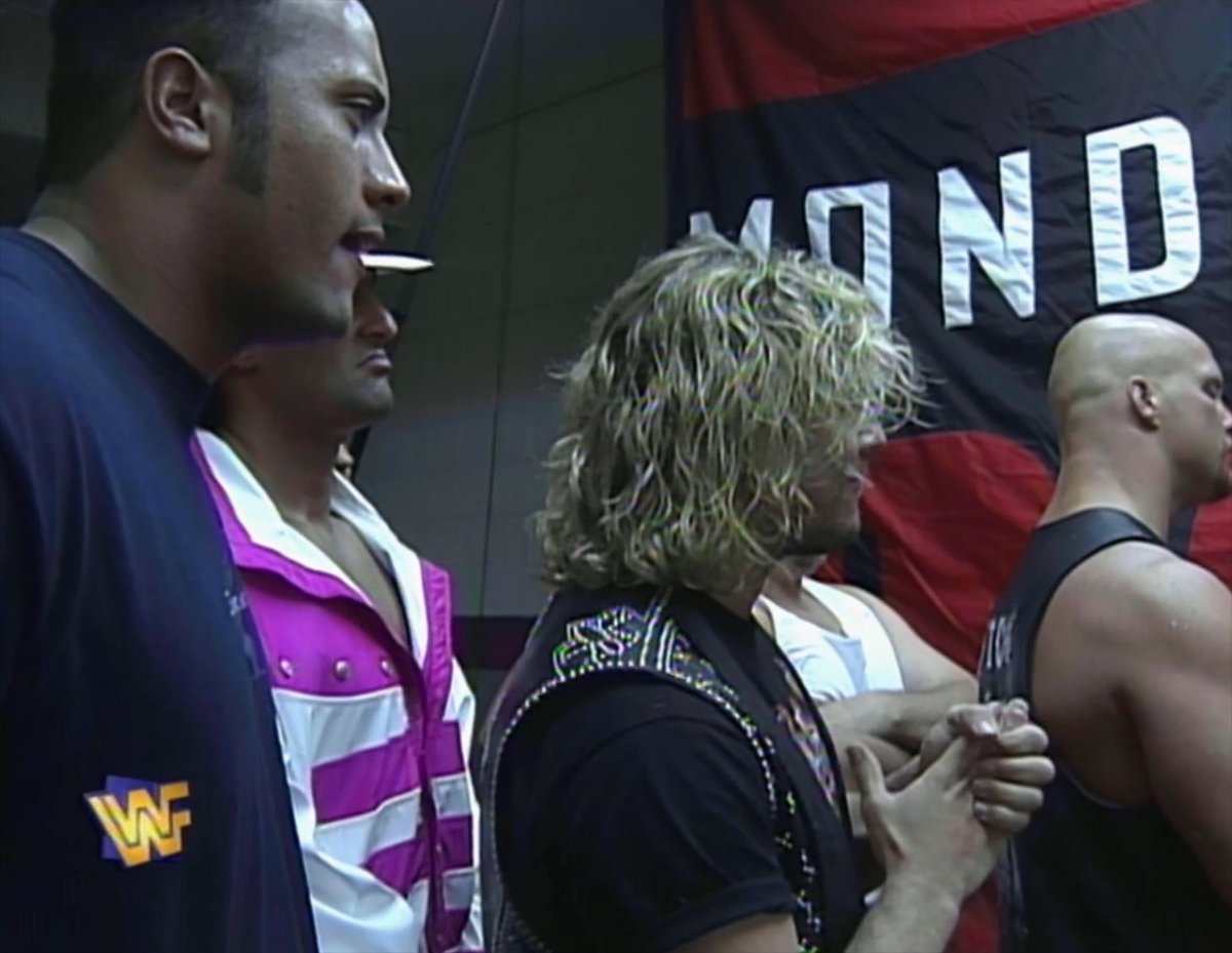 #OnThisDayInWWE 30 years ago on #WWERaw : The Rock makes an inconspicuous, unofficial debut, a month before his big moment at Survivor Series Would love to know the story behind this, but knowing how the Hitman mentored young Rocky Maivia, I'm sure Bret got him in this shot Dwayne Johnson Bret Hart