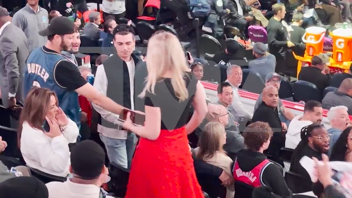 😳 Exclusive: Trump staffer Britt McHenry throws drink at fan at NBA game.