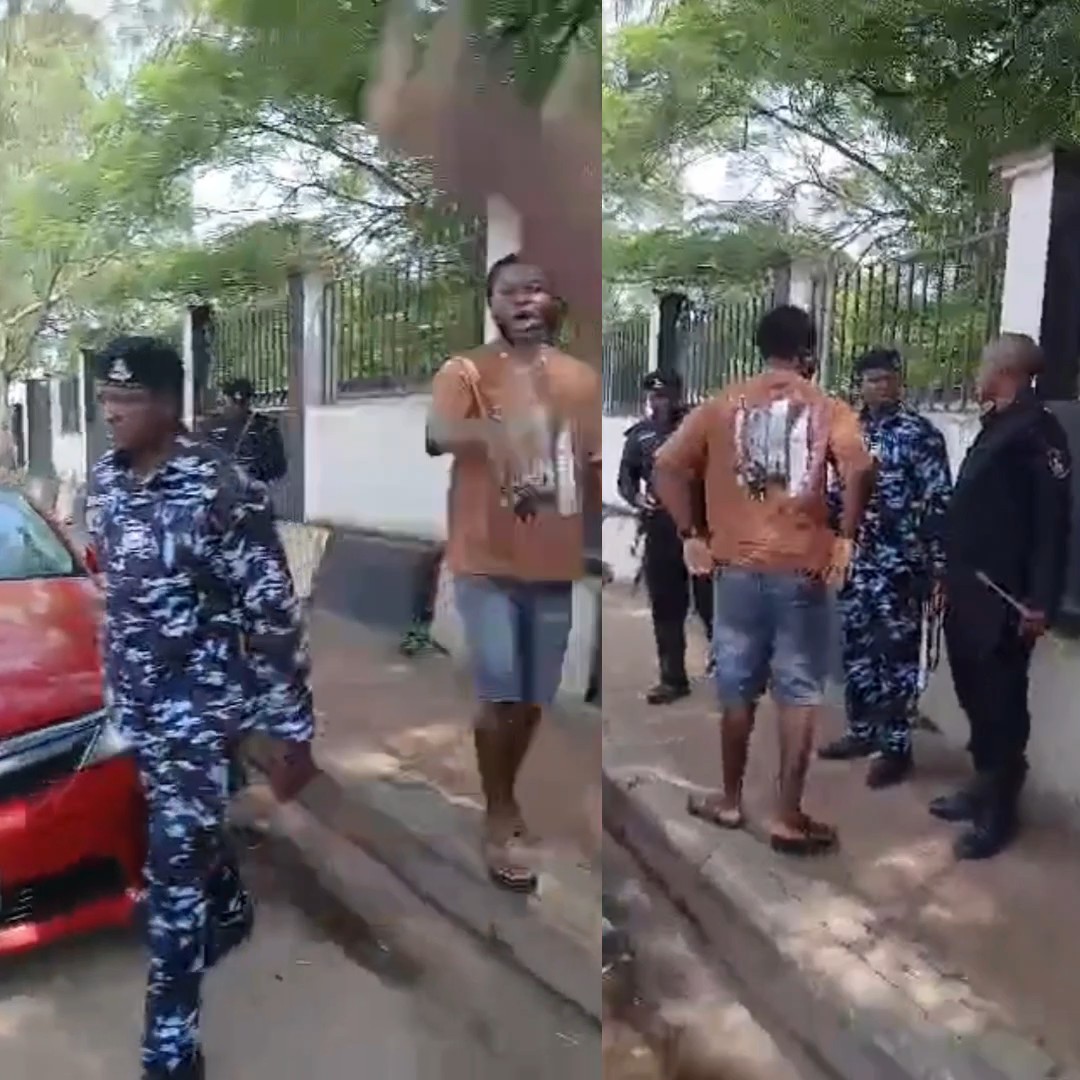 Moment a man confronts Nigerian police officers at a checkpoint in Anambra State, accusing them of damaging his car’s side mirror.