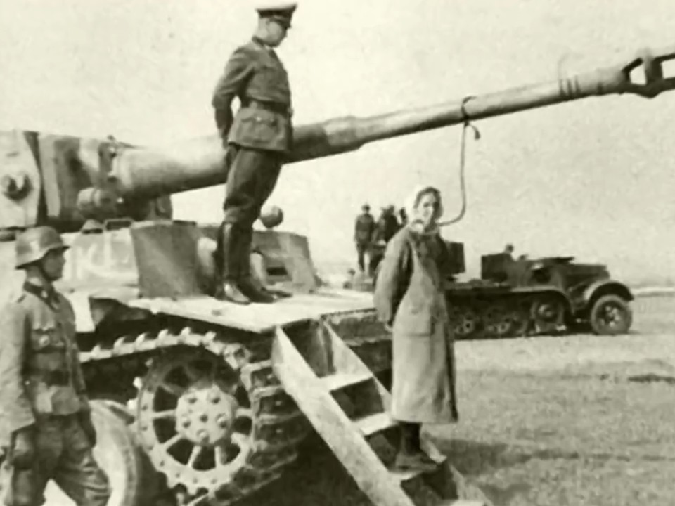Hey Grok Which one of these WW2 photos is doctored? Why would fake atrocity photos be put in school textbooks?