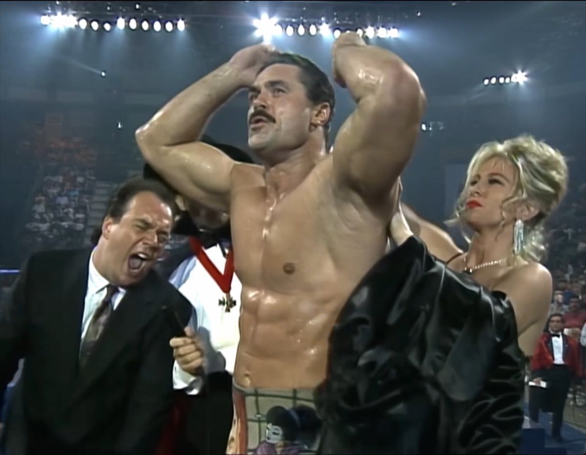 #OnThisDayInWWE 35 years ago at Halloween Havoc '91: A very Ravishing, but Rude, reveal of who's the WCW Phantom And he's a Paul Heyman Guy - that's a Dangerous Alliance, you could say... Paul Heyman Madusa/AlundraBlayze