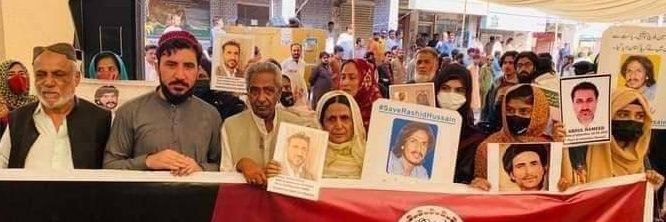 Mama Qadeer Baloch's banner