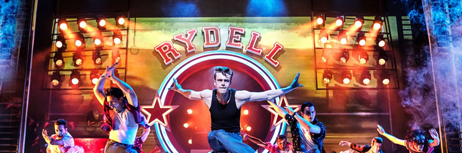 Grease the Musical's banner