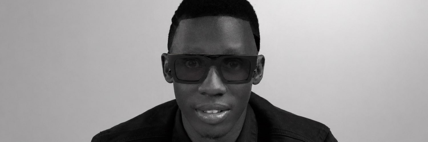 Douglas Lwanga's banner