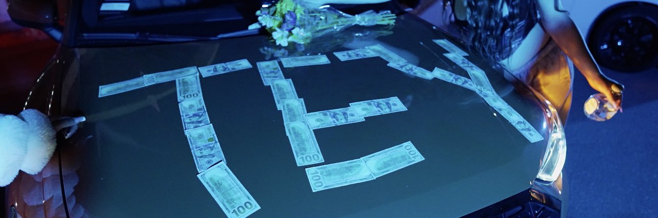 T's banner