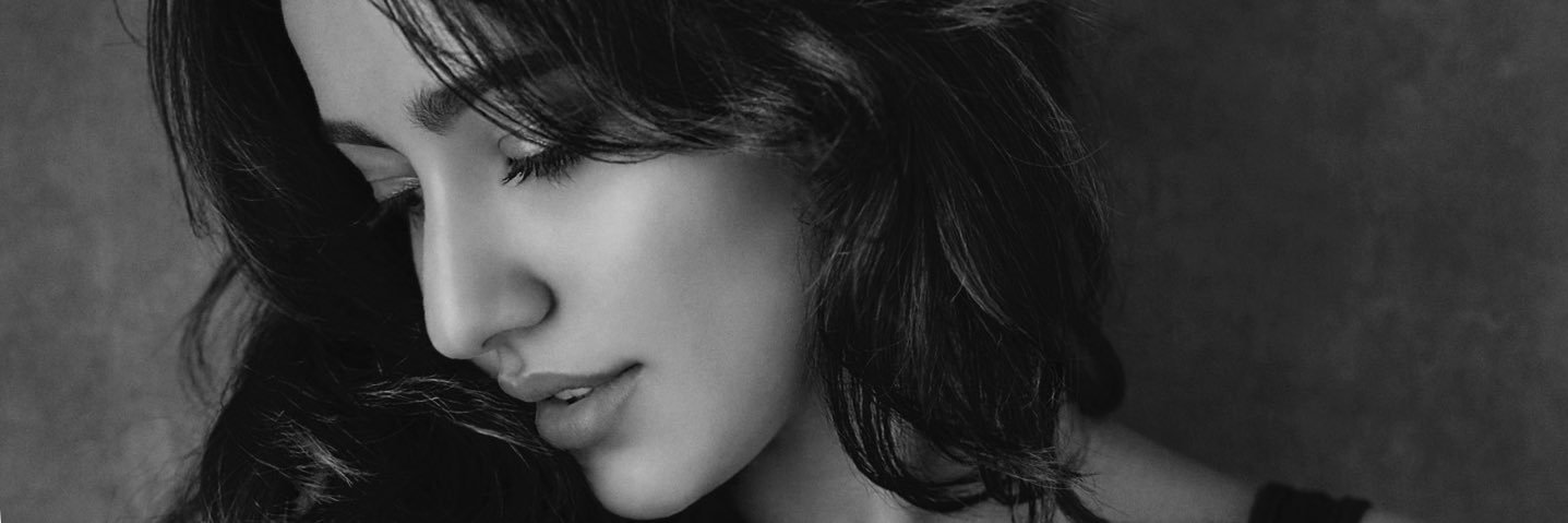 Neha Sharma's banner