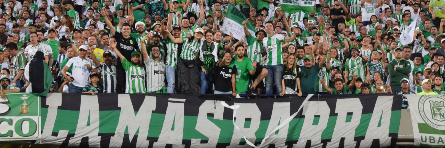 M A N U E L A's banner