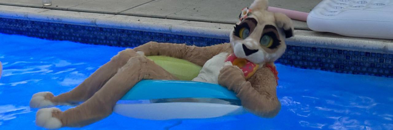 Honey the Swimming Lioness's banner