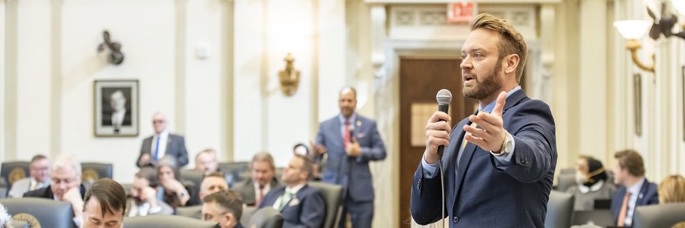 Rep. Mickey Dollens's banner