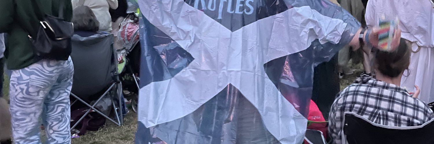 Shona Robison SNP's banner