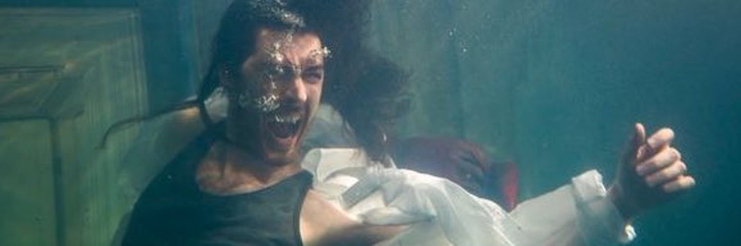 gio HELD HOZIER's HAND's banner