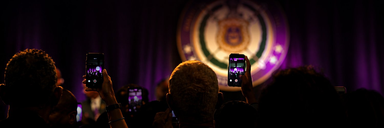 Omega Psi Phi® Fraternity's banner