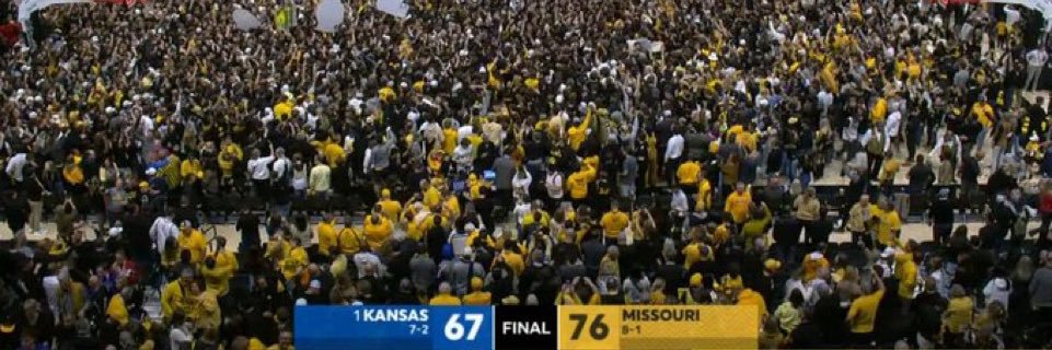 Sidelines Mizzou's banner