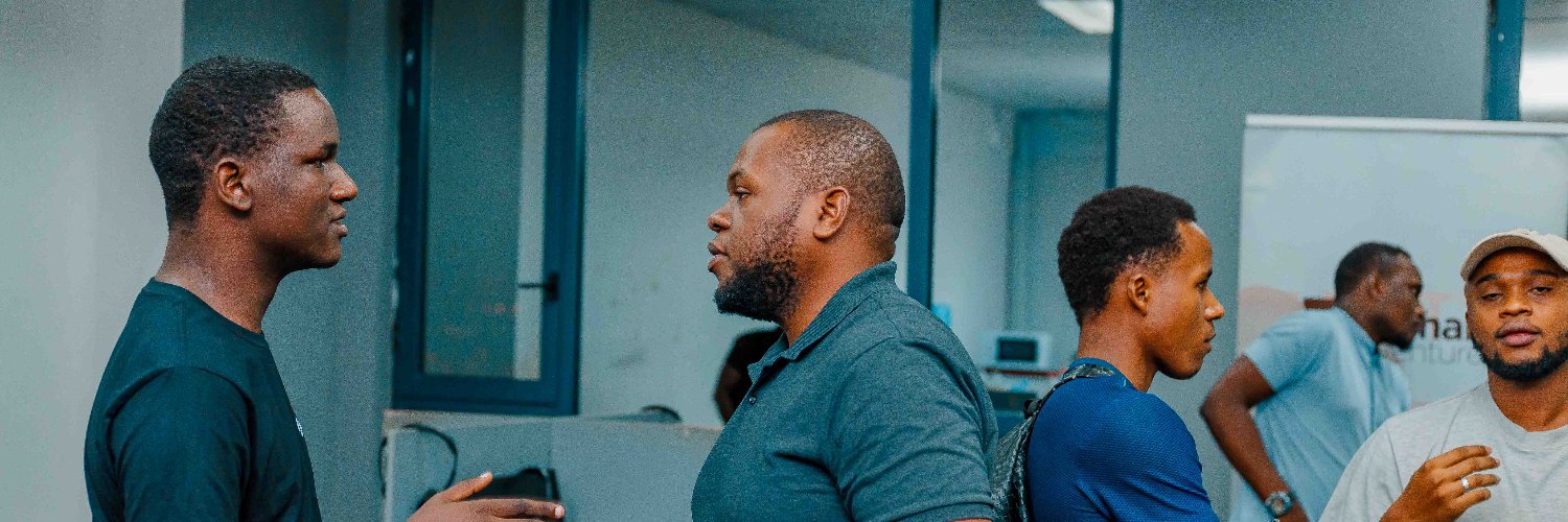 Moments with Mafole Baraka's banner
