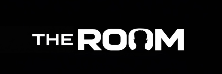 The Room's banner