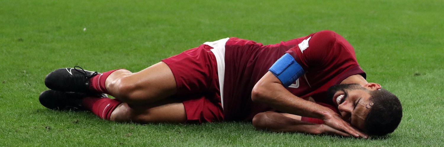 out of context Qatar football's banner
