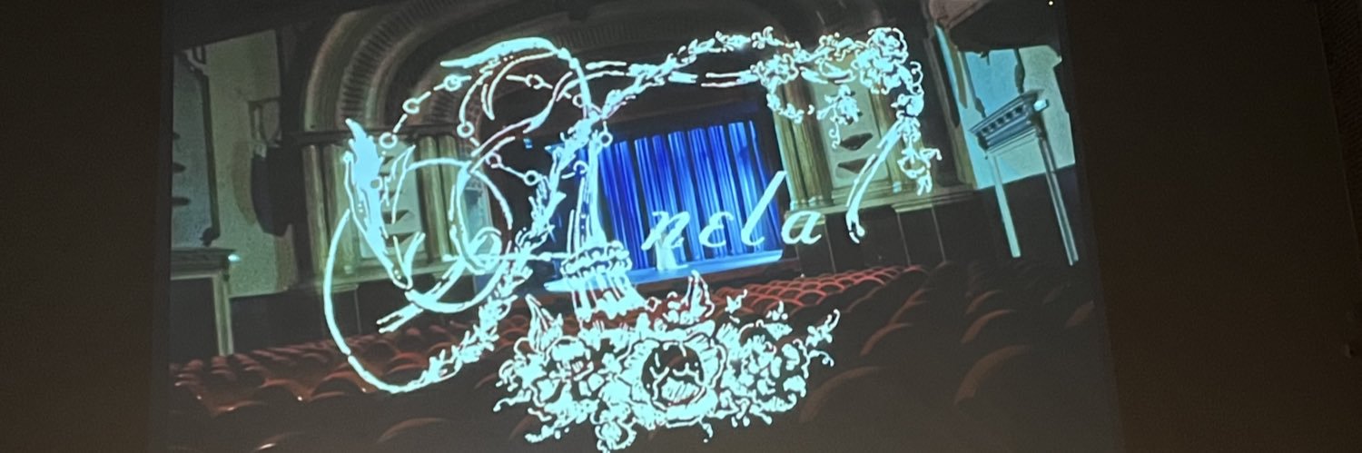out of context belén aguilera's banner