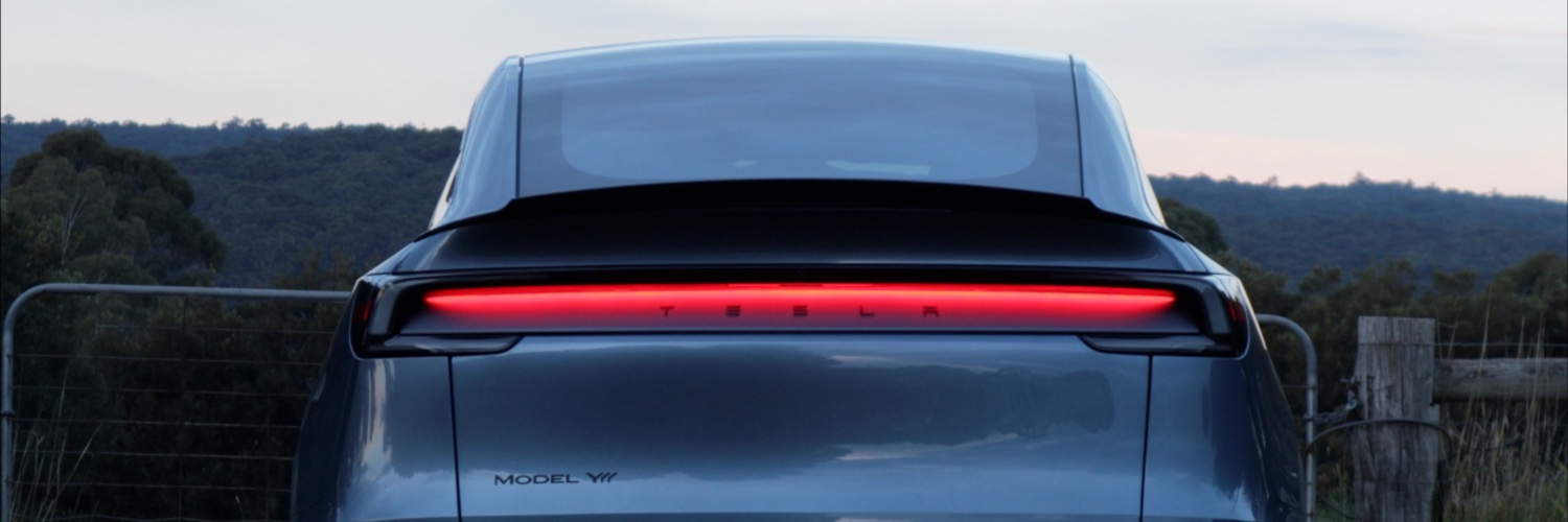 Ryan's Model Y's banner
