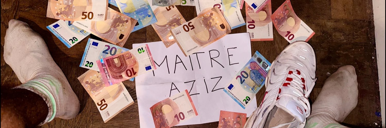 Maitre Aziz's banner