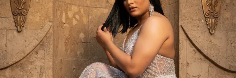 Nia Sharma's banner