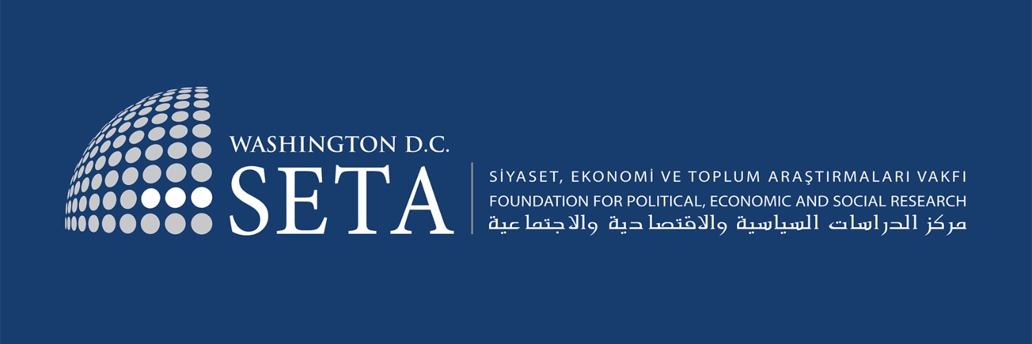 The SETA Foundation at Washington DC's banner