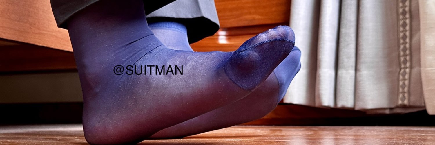 SUITMAN's banner