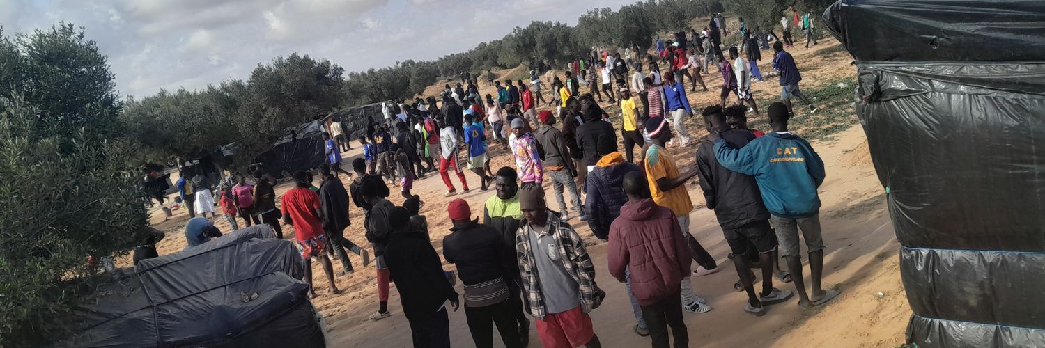 Refugees in Tunisia's banner