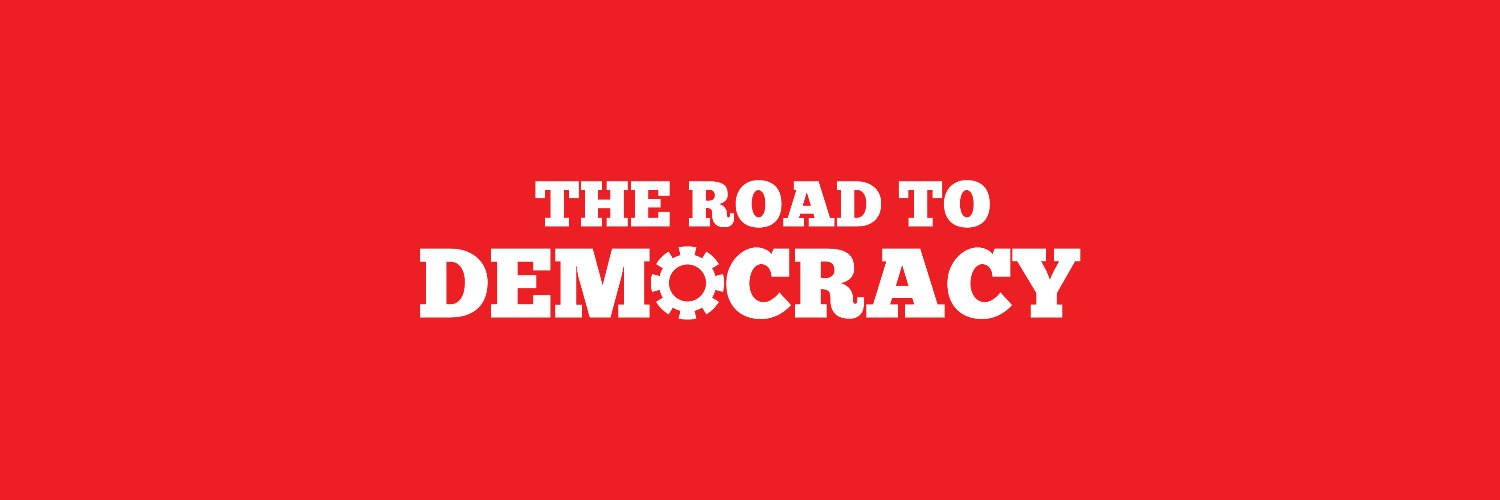 The Road to Democracy's banner