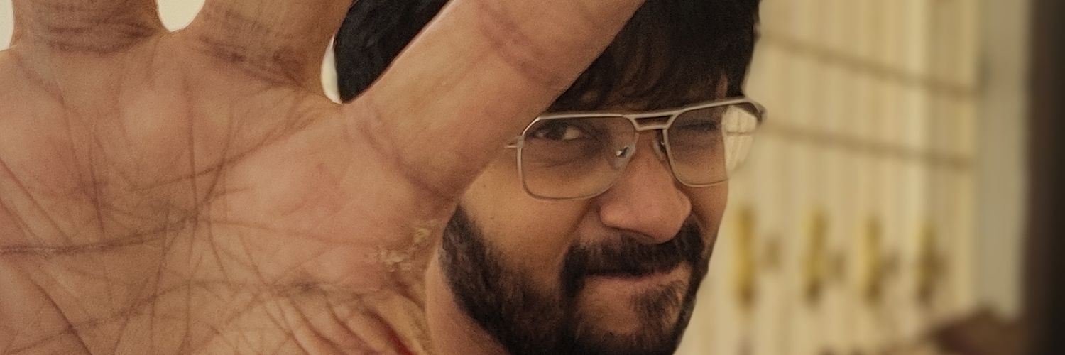 pop Suresh's banner