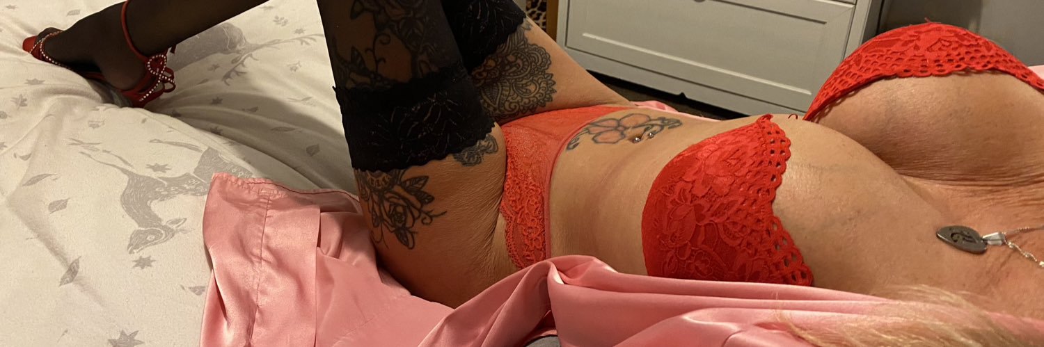 The Busty Blonde MILF's banner