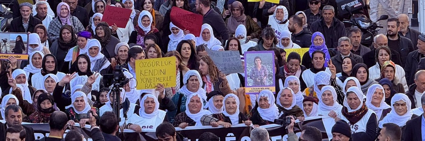 Mirovatî - Defend Rojava's banner
