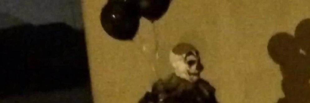 abusive clown stroking his shit's banner