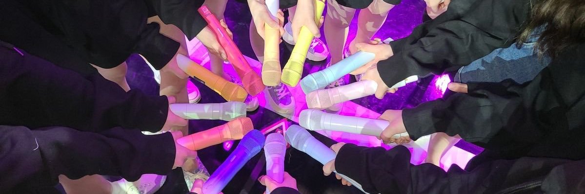 Iz*one on this day's banner