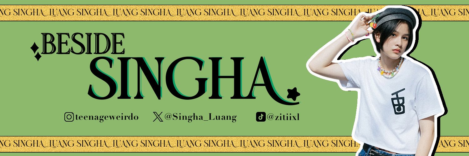 Beside Singha's banner