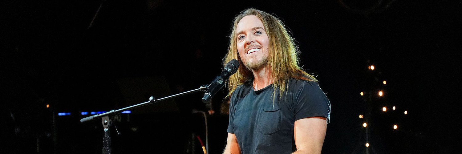 Tim Minchin's banner
