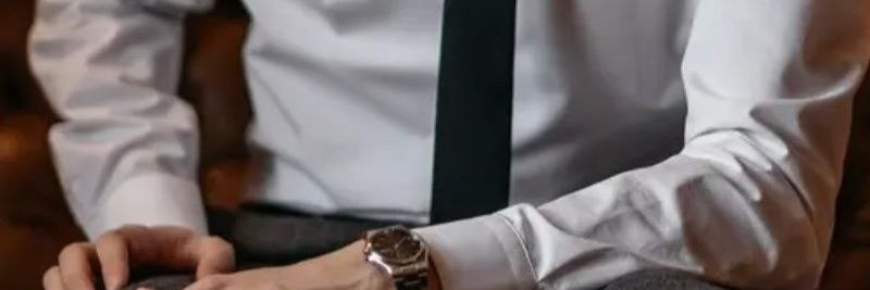 Master in suit's banner