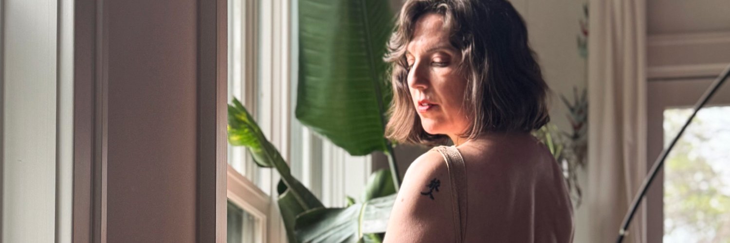 M Tease's banner