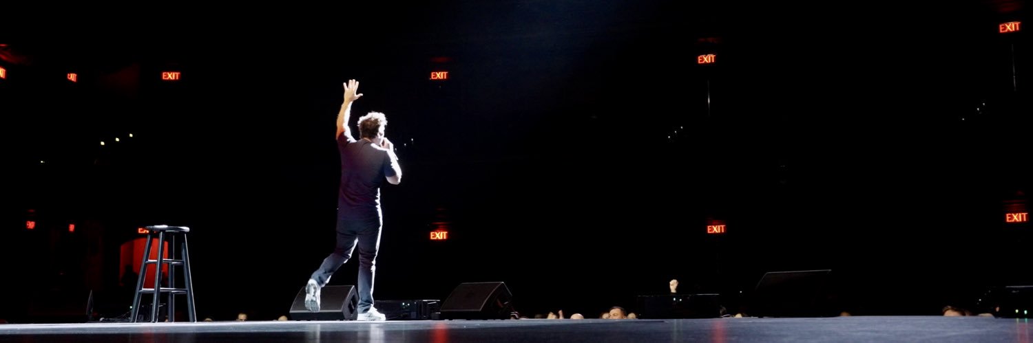 Dane Cook's banner