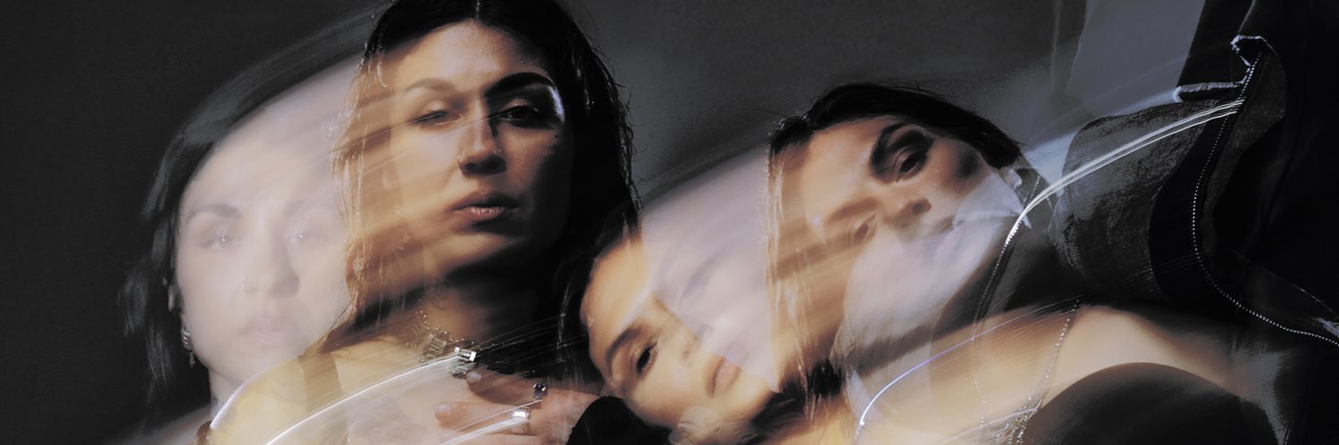 Krewella's banner
