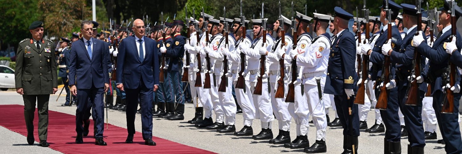 Nikos Dendias's banner