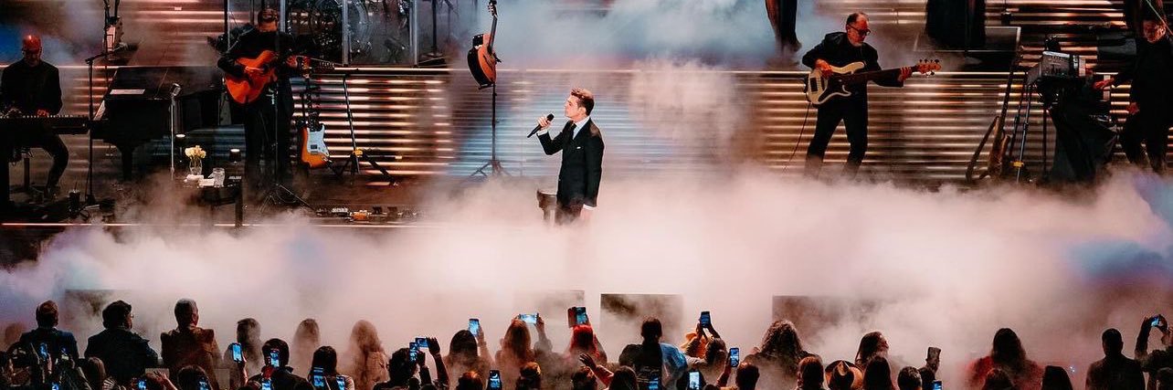 Luis Miguel Deluxe's banner