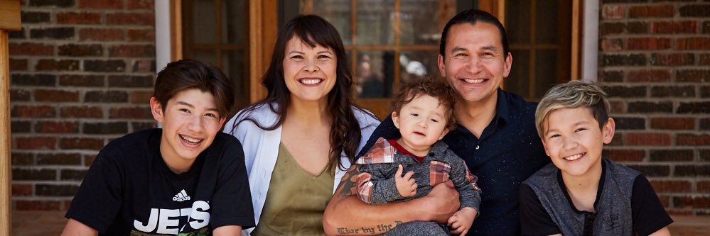 Wab Kinew's banner