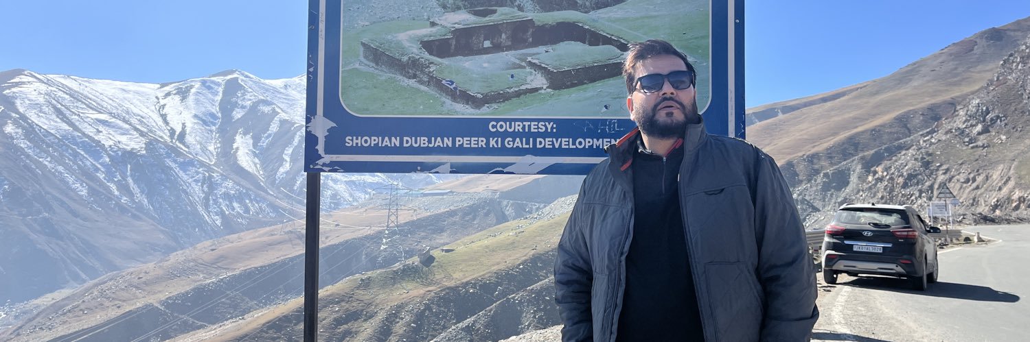 Dr Raja Muzaffar Bhat's banner