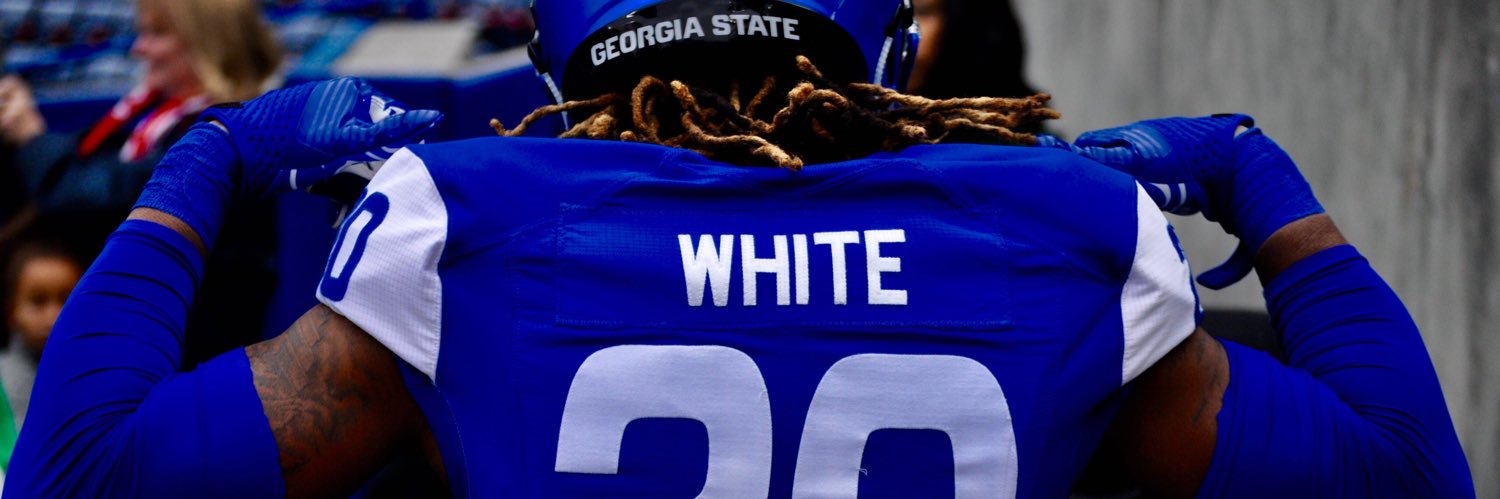 Qua White's banner