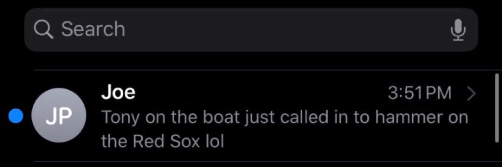 Tony on the boat's banner