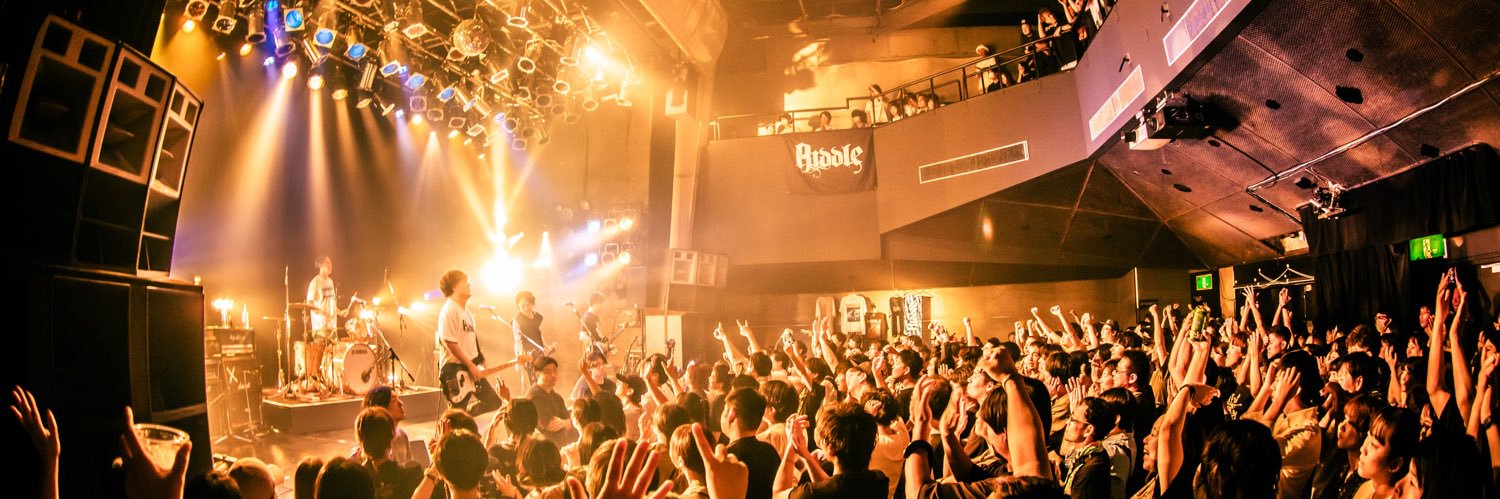 RIDDLE official's banner