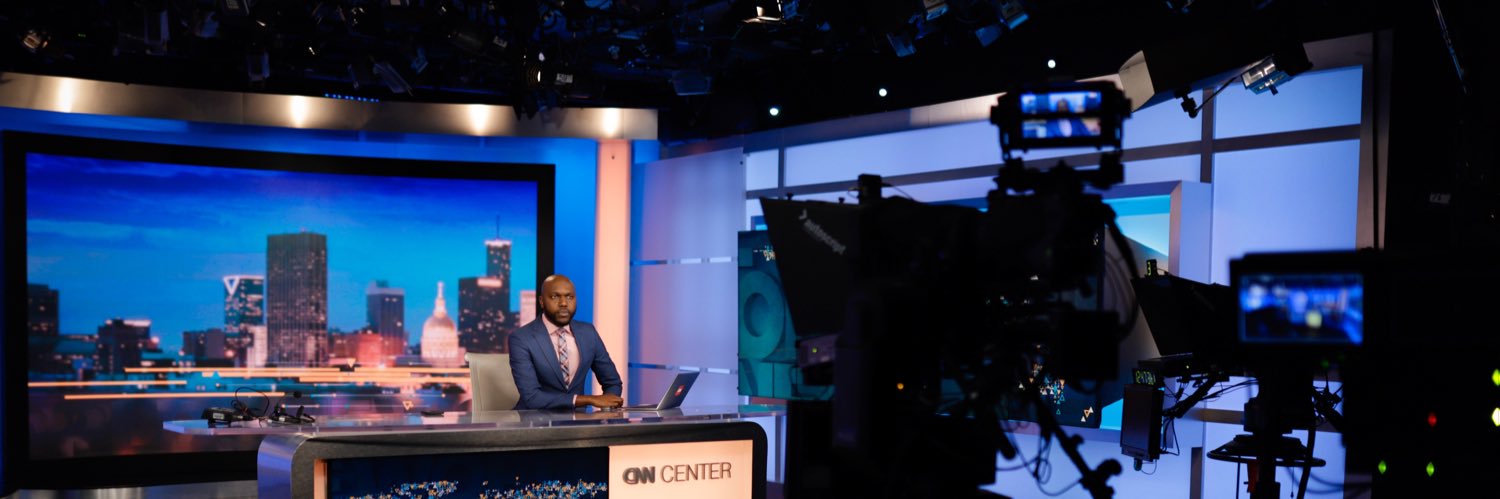 Larry Madowo's banner