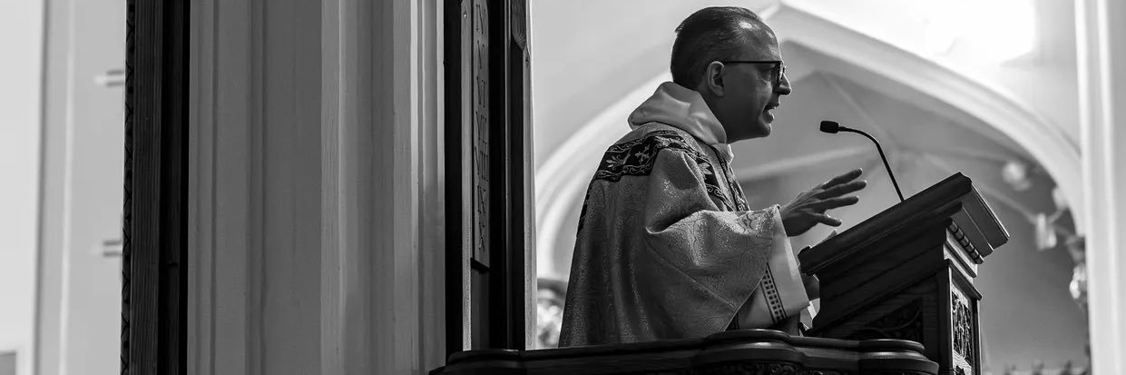 Fr. Thomas Petri, OP, STD, KHS's banner