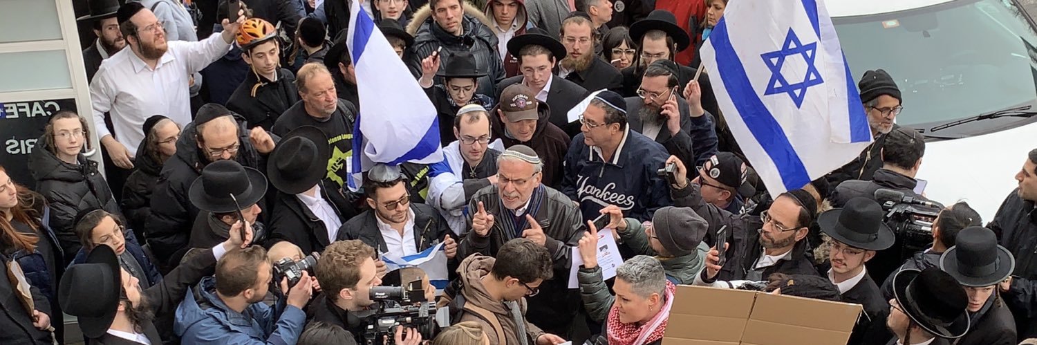 Dov Hikind's banner