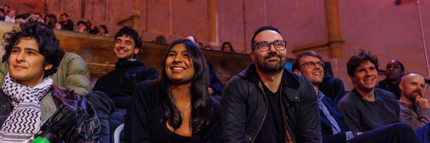Aaron Bastani's banner